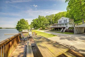 Image of Big Pine Island Lake Cottage with Boat Dock and Kayaks