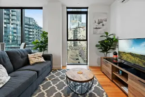 Image of Bright Apartment with City Views in Trendy Locale