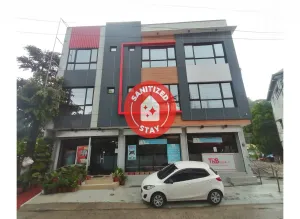 Image of Capital O 811 Tri A's Building