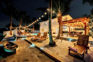 Image of Waterfront Villa with Beach, Game Room, Cinema and Spa