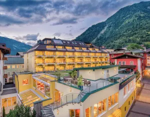 Image of Hotel Norica - Thermenhotels Gastein mit dem Bademantel direkt in die Therme