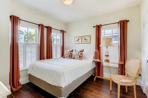 Image of The Pink House - Bask in Style Steps from the Convention Center