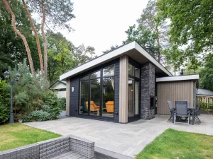 Image of Beautiful chalet with a fireplace in a wooded area