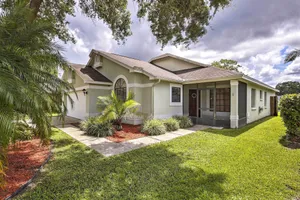 Image of Lakefront Brandon Home with Patio and Screened Lanai!