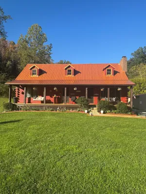Image of Log Cabin in the Field