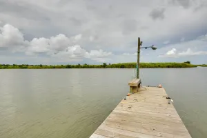 Image of Golden Meadow Getaway Waterfront Retreat with Deck