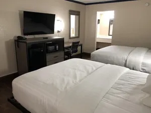 Image of Travelers Inn and Suites Wharton