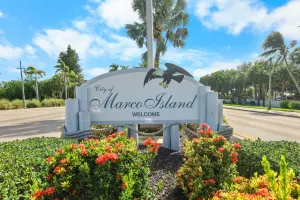 Image of Cozy home with sunroom, pool and steps to beach