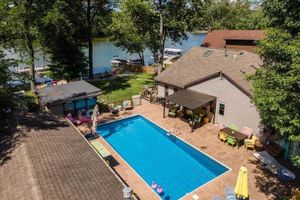 Image of Rock River Retreat with Dock and Private Backyard!