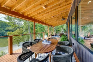 Image of Modern, Riverfront Family House with Balcony and Grill