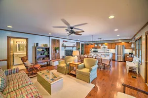 Image of Lakefront Harrison Home with Sunroom, Deck, and Dock!