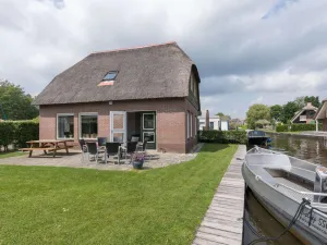 Image of Stylish Thatched Villa With a Dishwasher at Giethoorn