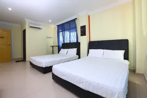 Image of SPOT ON 89857 Azra Inn Rumah Tumpangan