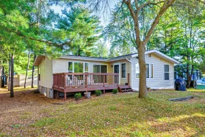 Image of Lakefront Nekoosa Home: Private Beach & Boat Dock!