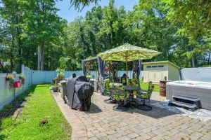 Image of Outdoor Oasis + Hot Tub: Maryland Home w/ Bar!