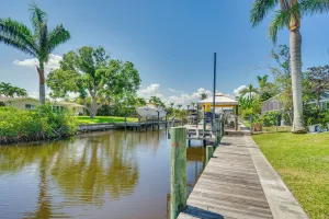 Image of Canalfront Home with Dock and Pool 5 Mi to Ft Myers!