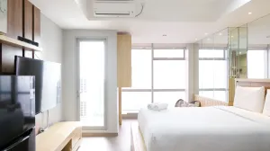Image of Best Deal and Smart Living Studio at Grand Sungkono Lagoon Apartment By Travelio