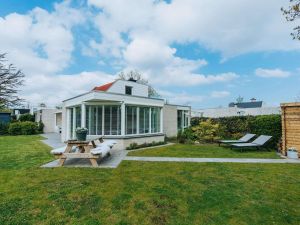 Image of Bright Holiday Home With Covered Veranda