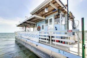Image of Boat and Fish on Mille Lacs Lake Walleye Cabin