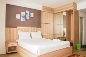 Image of Serene Studio Room At Apartment Emerald Towers Bandung