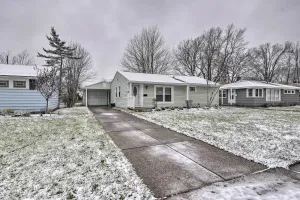 Image of Serene Buffalo Dwelling with Backyard BBQ Patio