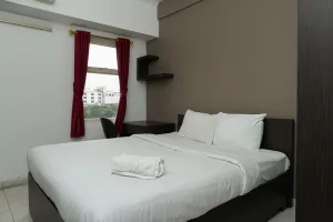 Image of Relaxing Studio Apartment at Margonda Residence 2 near UI By Travelio