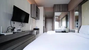 Image of Delightful Studio Apartment at Orchard Supermall Mansion By Travelio
