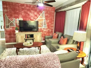 Image of \"Charming 3-Bedroom Home with Private Gym in Prime Neighborhood!\"