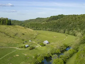 Image of Riverfront Cattle Farm Home in the Mountains