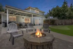 Image of 5 Minutes from Downtown- Game room, firepit and TV in every bedroom!