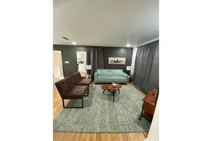 Image of Cozy place with work space.