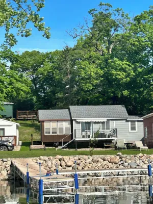Image of Modern lakeside cabin with panoramic views , deck and  screened porch