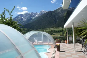 Image of Holiday house inmidst of ski areas with pool, sauna, solarium & tiled stove