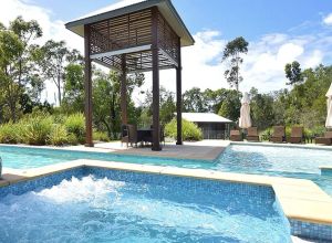 Image of Luxury 2 bedroom house-family getaway in bushland resort: beach,pool,spa,tennis.