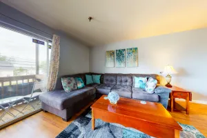 Image of Inviting condo in quiet locale with partial lake views, balcony & grilling area