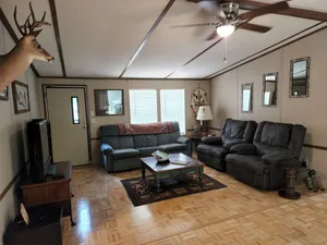 Image of 1-1\/2 acre Park like wooded setting.  Clean 3\/2 with plenty of parking.