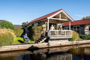 Image of Stay in our cozy Meine 4 luxury chalet with a private dock and sauna.