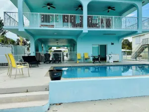 Image of Yellowtail Island Retreat, pool, dockage and covered patio