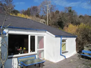 Image of Traditional stone built cottage with fantastic view of lake and mountains