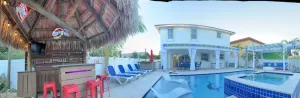 Image of 5 Mins to beach; 5BD, 4.5BA, Heated pool, Jacuzzi, Mini Golf, Tiki Huts.