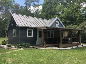 Image of Cozy cottage with firepit, in walking distance to beach and the town!