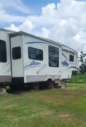 Image of RV Executive Home IV in tranquil setting, Indoor - Inground Pool