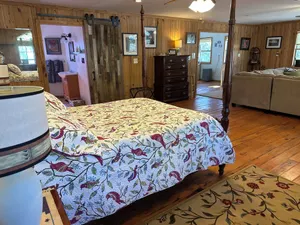 Image of The Cozy Cute Rustic Lodge close to everything. Clean & Spacious- Fire Pit.