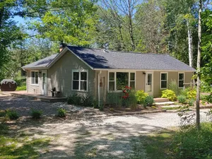 Image of Tranquil Cottage in the Woods with Lake Michigan only 300 feet away.
