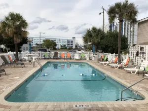 Image of Sun, Sand & Pool! One block from the beach!