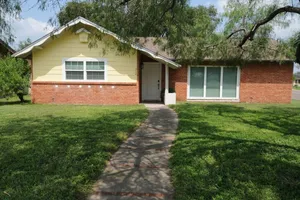 Image of Cozy Cottage with Mid-Century Charm