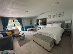 Image of Fenced Studio with private parking ,access to patio and backyard .