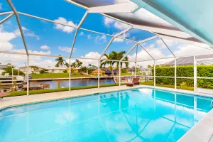 Image of Inviting dog-friendly home with pool, water view, central AC, & W\/D