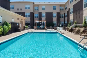 Image of Cozy and Laptop-friendly Studio | Pool & Gym.
