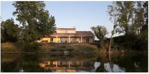 Image of Contemporary house with heated swimming pool on the edge of a private lake... paradise